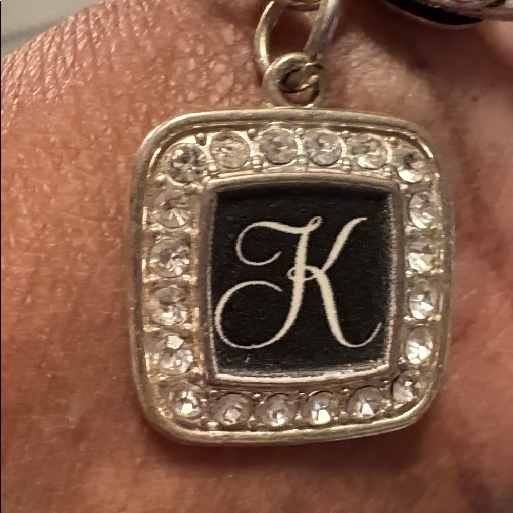 Elegant Silvertone Bracelet with Black Charm K, Inscribed - Picture 2 of 5
